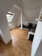 Wohnzimmer - Gemütliche Dachgeschosswohnung mit Charme zur Eigennutzung